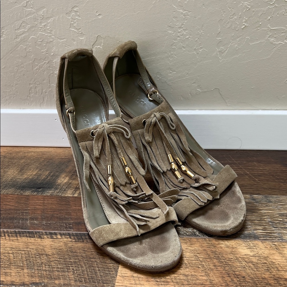 Gucci brown suede fringe slingback heels featuring gold-tone accents